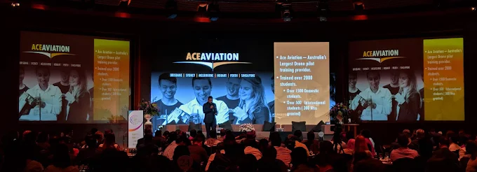 ACE Aviation presenting on stage as Australia's largest drone pilot training provider at an industry event
