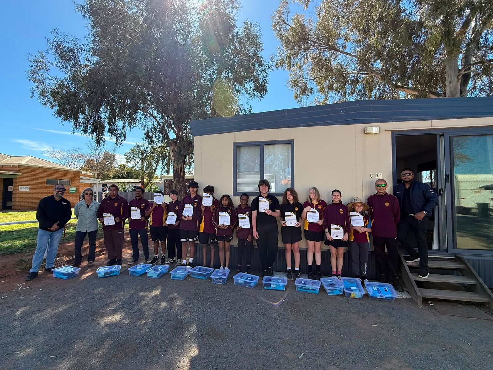 Leonora District High School students holding their certificates after the ACE NextLab future-skills program