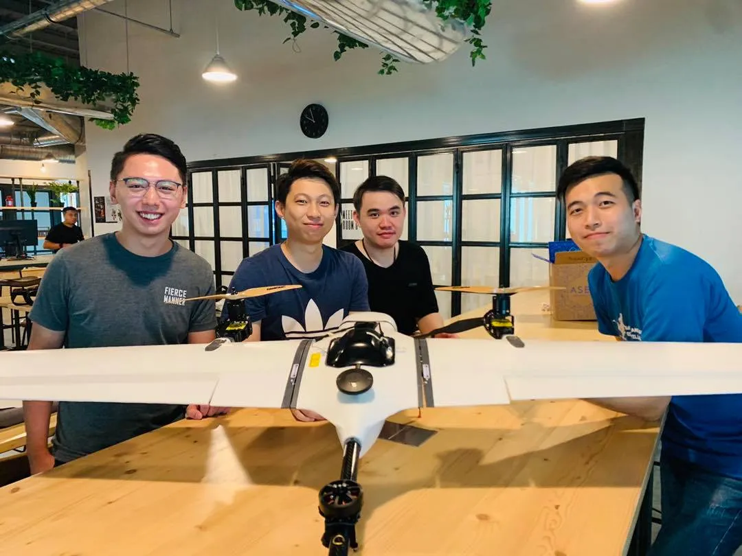 Trainees with a fixed-wing VTOL mapping drone after ACE Aviation training